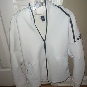 Never worn adidas jacket. Fits like a true medium. Workout or lounge jacket.
